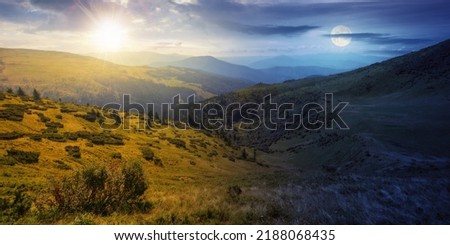 view in to the mountain valley at twilight. day and night time change concept. beautiful summer landscape of trascarpathia with forested hills and grassy alpine meadows beneath a sky with sun and moon