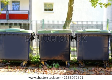 large plastic garbage container, in Germany, garbage collection in designated place, environmental concept, different types of garbage into different bins, environmental protection, waste recycling