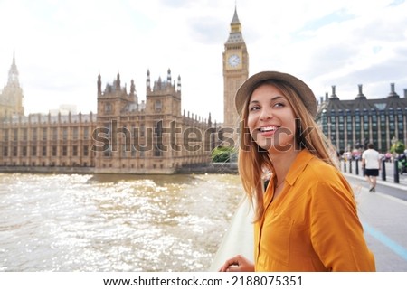 Smiling female tourist visiting London sights, United Kingdom Royalty-Free Stock Photo #2188075351