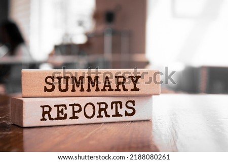 Wooden blocks with words 'Summary Reports'. Business concept Royalty-Free Stock Photo #2188080261