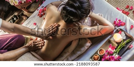 asian women beauty relaxation body massager massage skin hands lifestyle natural massage cure office syndrome , spa therapy , healthcare Relax in the Resort Wellness Retreats Thai Massage Royalty-Free Stock Photo #2188093587