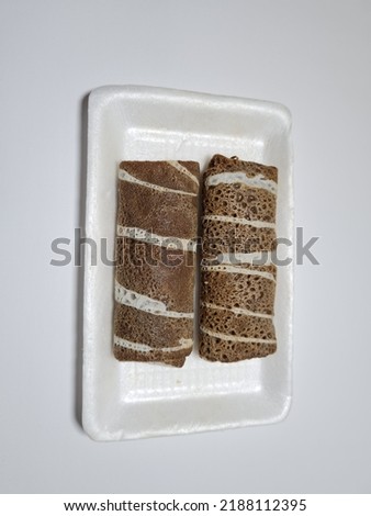 A typical Indonesian snack made from flour and other ingredients called omelet rolls sweet
