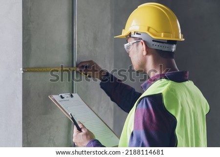 Construction concept , Foreman officer inspector defect about engineer architect work home building before complete project Royalty-Free Stock Photo #2188114681