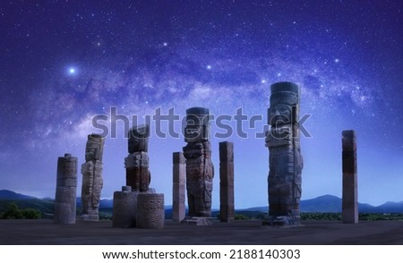 Toltec sculptures in Tula against the background of the starry sky, Mexico Royalty-Free Stock Photo #2188140303