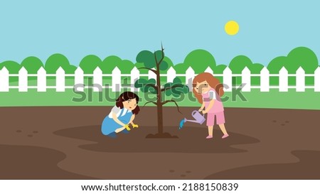 Two girls watering a tree seedling
