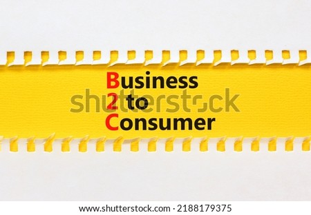 B2C business to consumer symbol. Concept words B2C business to consumer on yellow paper on a beautiful white background. Business and B2C business to consumer concept. Copy space.