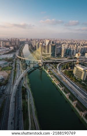 Aerial view of Octavio Frias de Oliveira Bridge (Ponte Estaiada) over Pinheiros River at sunset - Sao Paulo, Brazil Royalty-Free Stock Photo #2188190769