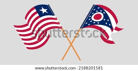 Crossed and waving flags of Liberia and the State of Ohio. Vector illustration
