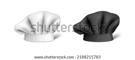 3D Black And White Chef Hat Isolated On White. EPS10 Vector Royalty-Free Stock Photo #2188215783