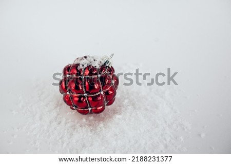 festive christmas ball on white background with snow