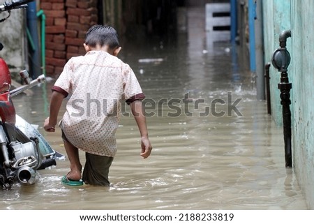 Pakistan Flood stock image 2022. A flood in a city and streets. Pakistan Flood 2022 stock image. Flood in Pakistan 2022 image. Royalty-Free Stock Photo #2188233819