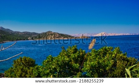 Croatian landscape: Adriatic sea, panoramas. Lukovo bay seen from hill.  The island of Pag in the background