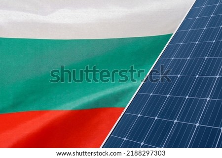 Solar panels against flag Bulgaria background. Solar battery generates a pure electricity. Concept of sustainable resources and renewable energy in Bulgaria