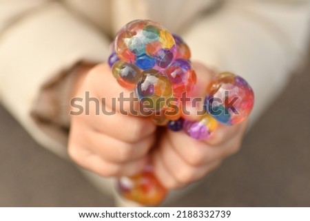 Antistress toy mesh ball filled with hydrogel Royalty-Free Stock Photo #2188332739