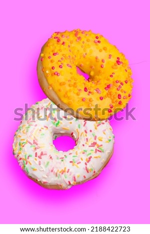 orange donut with mango glaze and white chocolate donut with sprinkles on a pink background