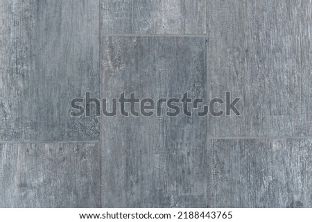 Abstract dark stone texture. Dirty wall background or wallpaper with copy space. Grunge old gray texture with scratches. Distressed grey grunge seamless texture. Overlay scratched backdrop