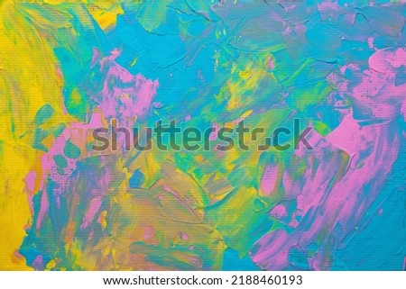 Macro Photo of Bright Hand-drawn Background Colorful Oil Painting on Canvas. Abstract Acrylic Paint Texture of Blue, Green, Pink, Yellow Colors.  Vibrant Colored Art Wallpaper or Backdrop.