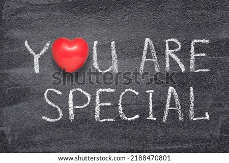 you are special phrase written on chalkboard with red heart symbol

