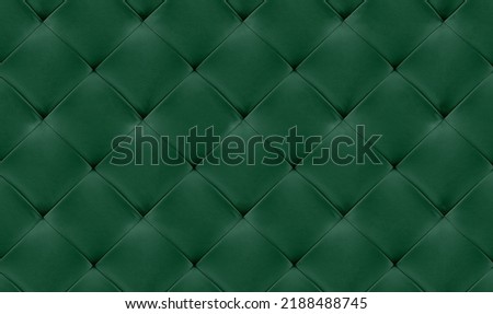 Green natual leather background for the wall in the room. Interior design, headboards made of artificial leather, leatherette , furniture upholstery. Classic checkered pattern for furniture, headboard Royalty-Free Stock Photo #2188488745