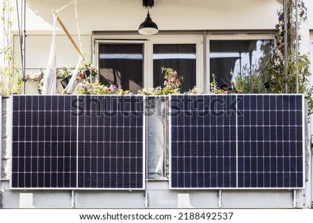 Solar panels on Balcony of Apartment block. House Solar Power Panel. Modern Solar Balcony Royalty-Free Stock Photo #2188492537