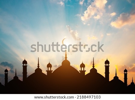 Mosques Dome on dark blue twilight sky and Crescent on background, symbol islamic religion Ramadan and free space for text arabic, Eid al-Adha, Eid al-fitr, Mubarak, Islamic new year Muharram Royalty-Free Stock Photo #2188497103