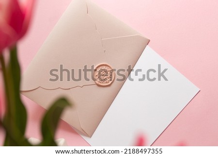 Photography from above of group of gift certificates.Tender pink color,banner with copy space.