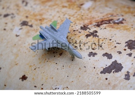 a toy. fighter aircraft. combat aircraft. aviation. plane crash. wings and turbines. Ukrainian aviation. Military Fighter