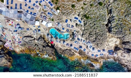Overhead aerial view of beautiful mediterranean beach and coastline in summer season