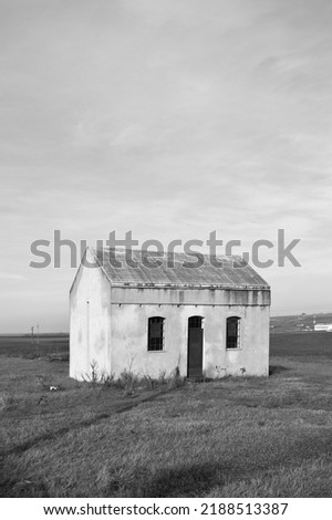 An abandoned building in the countryside fields