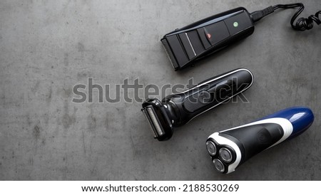 Electric razor of different types close-up. Razor. Male set. Royalty-Free Stock Photo #2188530269