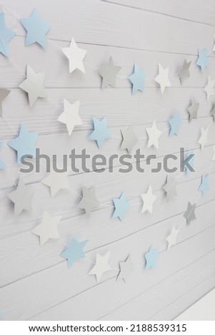 paper garlands on white background