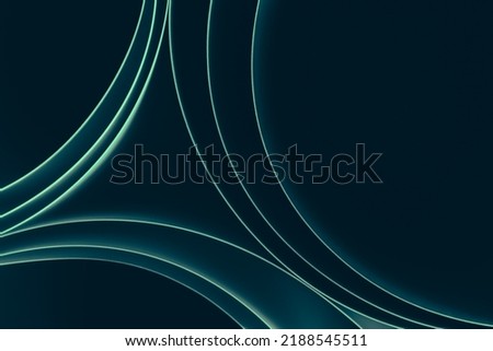 colored plastic sheeting rolls with beautiful shade and shadow on black background, creative graphic wallpaper with blue and green for presentation, concept of dynamic sci-fi or futuristic space