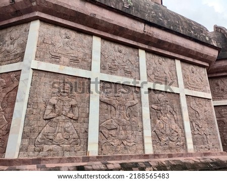 brown wall of temple with picture