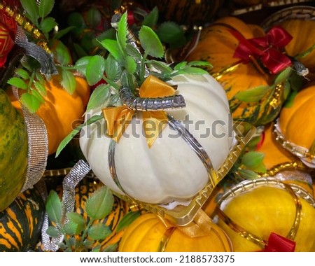 Little colouful fancy halloween pumpkins in market. 