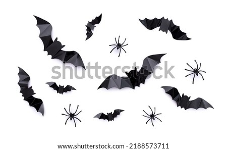 composition on the theme of the holiday halloween bats spiders on a white background
