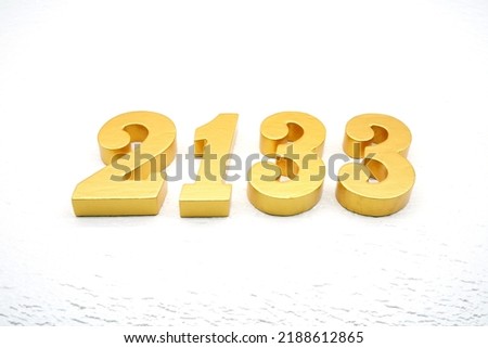  Number 2133 is made of gold painted teak, 1 cm thick, laid on a white painted aerated brick floor, visualized in 3D.                                 