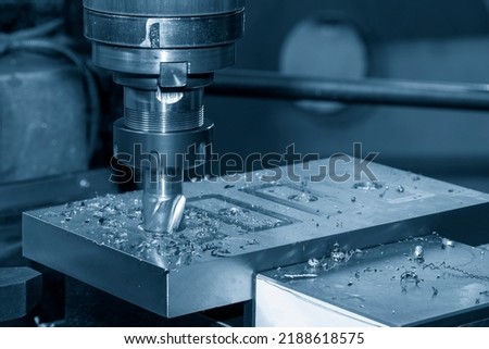 The milling process on NC milling machine. The metal working concept on the milling machine. Royalty-Free Stock Photo #2188618575