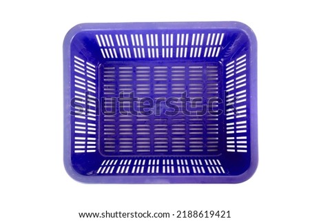 Blue plastic basket which is usually used to place vegetables and fruit that have been cleaned isolated on a white background.