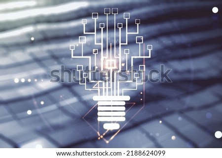 Virtual creative idea concept with light bulb and microcircuit illustration on blurry abstract metal background. Neural networks and machine learning concept. Multiexposure