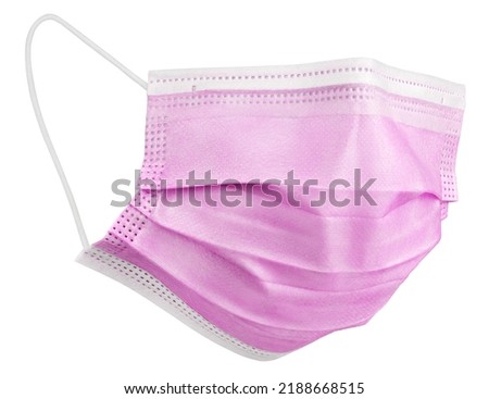 Pink medical protective face or surgical earloop mask isolated on white background with clipping path. Monkeypox outbreak prevention. Full Depth of Field.