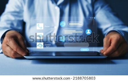 Customer using online service with chat bot to get support. Chat bot intelligent digital customer serviceconcept.Virtual assistant and CRM software automation technology.  Royalty-Free Stock Photo #2188705803