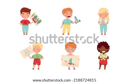 Cute kids showing their DIY crafts set. Boys and girl holding drawings cartoon vector illustration