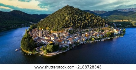 Most beautiful scenic Italian lakes - small picturesque lake Piediluco with colorful houses in Umbria, Terni province. Aerial panoramic view Royalty-Free Stock Photo #2188728343