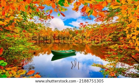 Lake view in autumn. Autumn landscape in beautiful colorful nature. Golden autumn leaves on beautiful lake. Forest landscape in colorful autumn season. Colorful lake scenery in the forest.