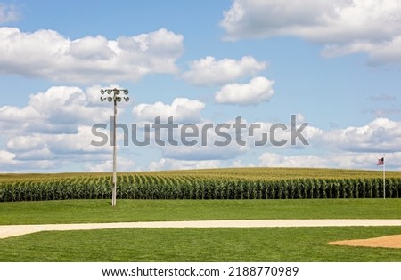 Field of Dreams baseball field in summertime, with cornfield and outdoor light pole.  July 30, 2022, Dyersville, IA USA