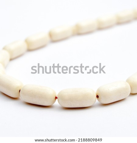 White beads sequenced, short rosary, tespih tesbih, an important accessory for Turkish culture, isolated on white background