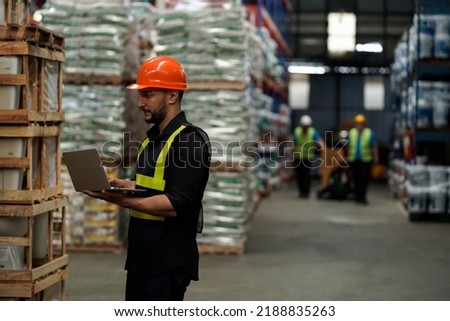 Warehouse workers selling stock checks with tablets,business idea