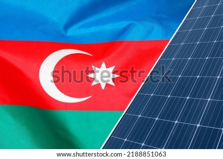 Solar panels against flag Azerbaijan background. Solar battery generates a pure electricity. Concept of sustainable resources and renewable energy in Azerbaijan
