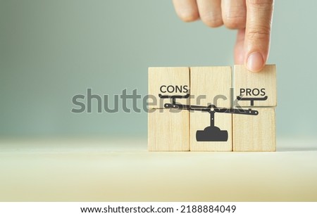 Quantitative Pros and Cons analysis concept. Concept for advantages disadvantages in business planning, evaluation and decision making. Quantifying options helps to weigh up your decision.  Royalty-Free Stock Photo #2188884049