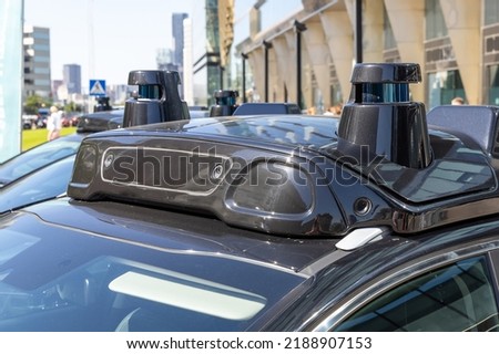 Sensors, cameras and lidars on the roof of a self-driving car. Close-up. Self-driving car testing Royalty-Free Stock Photo #2188907153